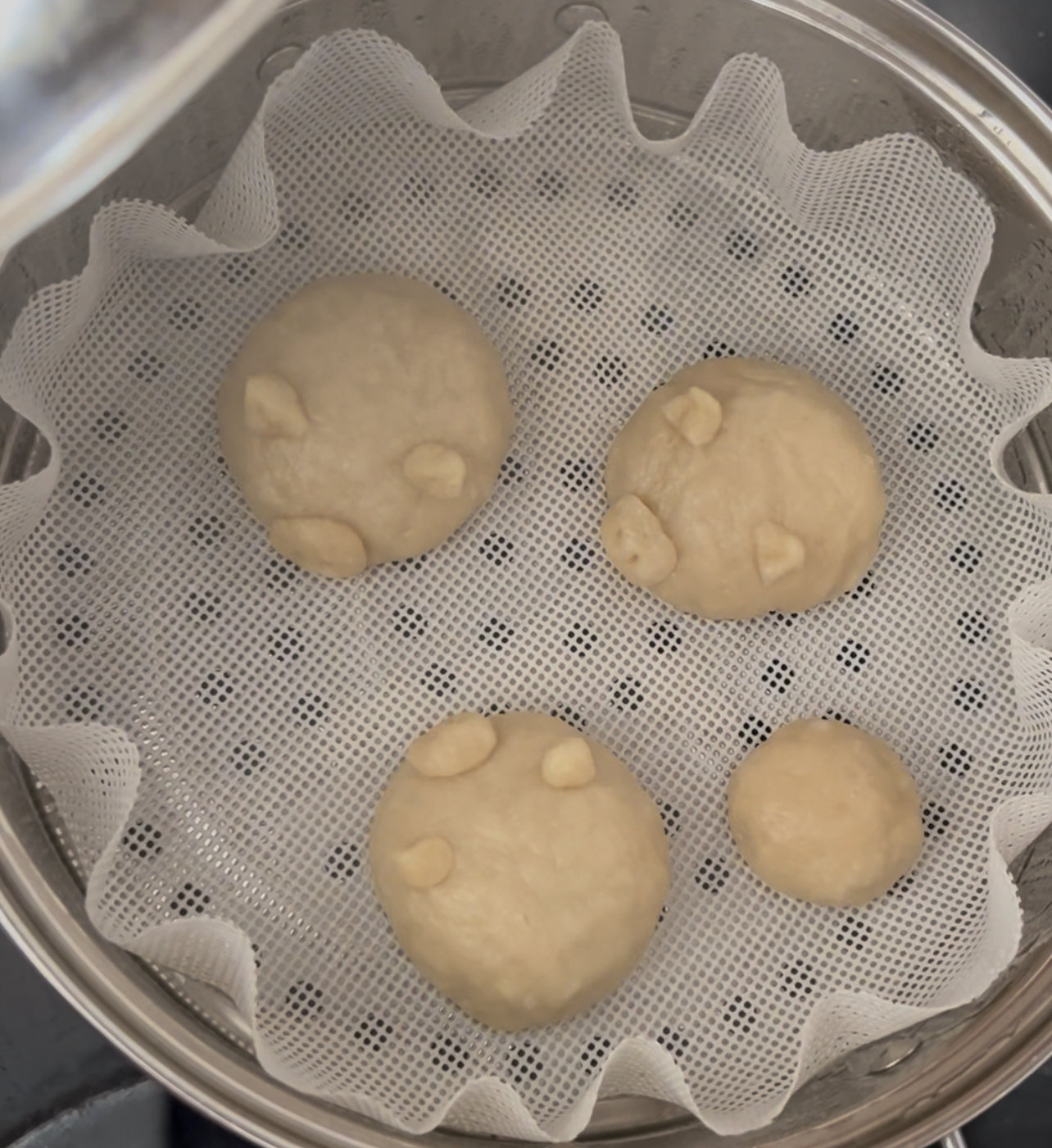 pig-shaped steamed buns and one round bun