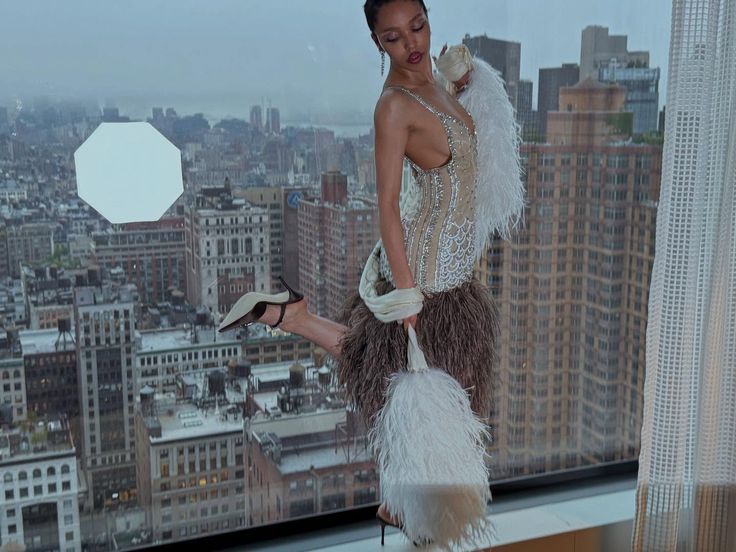 FKA Twigs fashion photoshoot with city skyline background
